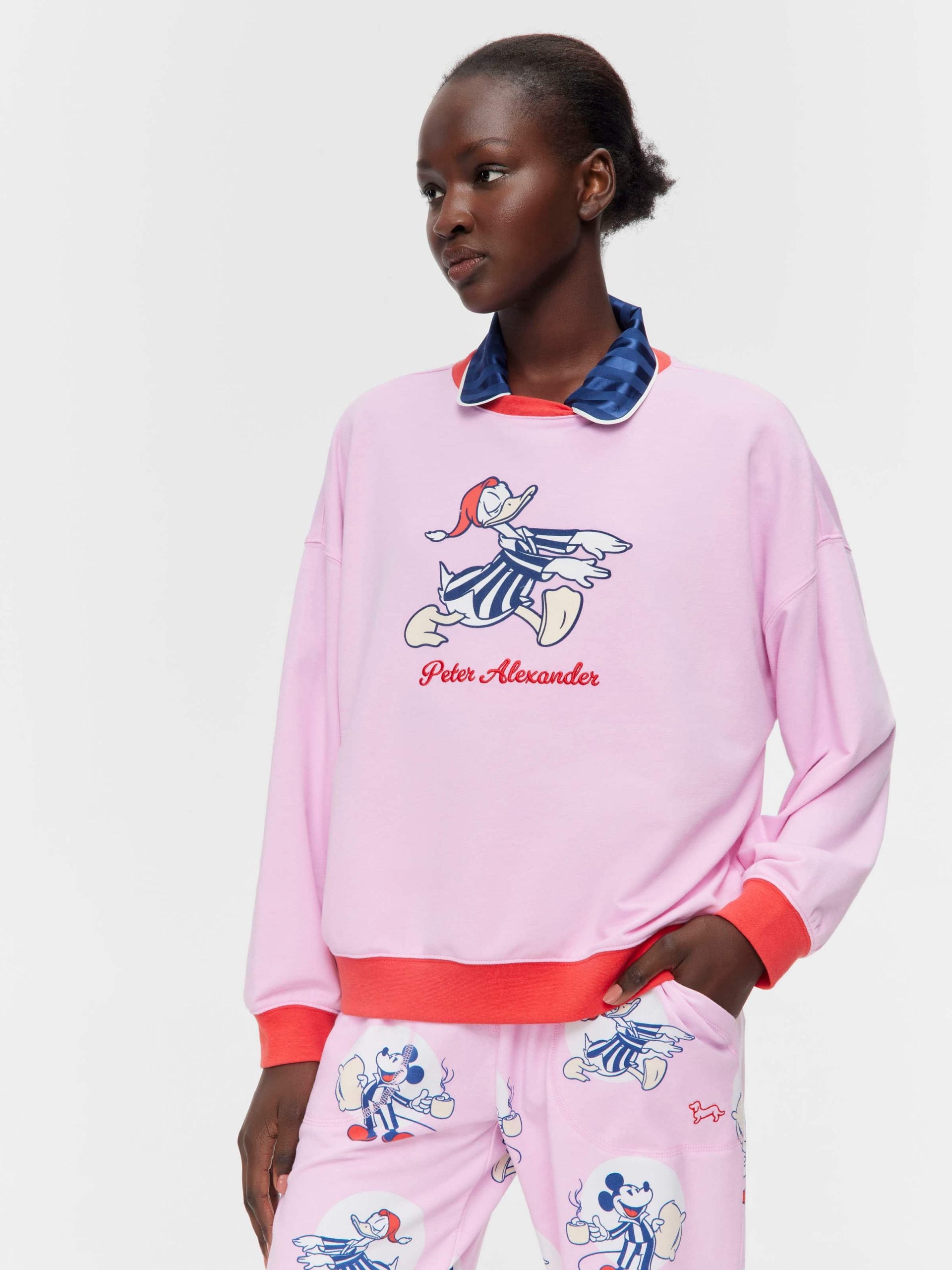 Sleepy Donald Duck Sweater Pink image 0